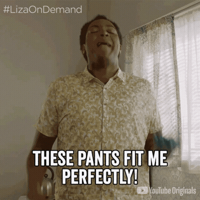 A Man Says " These Pants Fit Me Perfectly " In Front Of A Window GIF