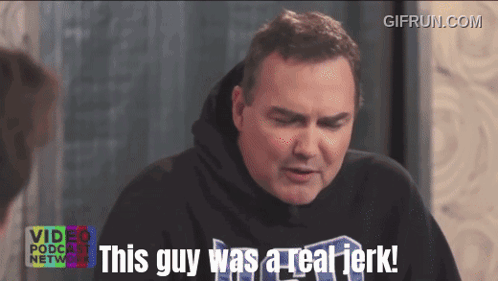 A Man Says " This Guy Was A Real Jerk " While Wearing A Video Podcast Network Shirt GIF