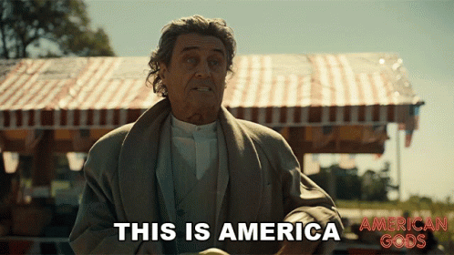 A Man Says This Is America In Front Of A Tent GIF
