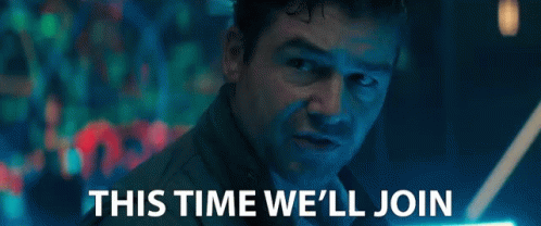 A Man Says " This Time We 'Ll Join " In Front Of A Blue Background GIF
