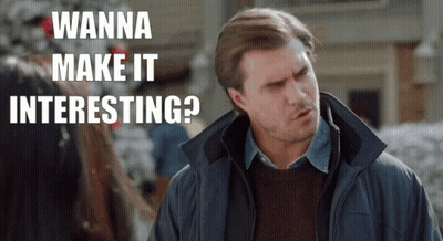 A Man Says " Wanna Make It Interesting " While Wearing A Blue Jacket GIF