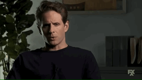 A Man Says " Was I A Person " In Front Of A Plant GIF
