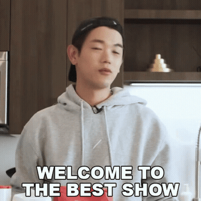 A Man Says Welcome To The Best Show While Standing In A Kitchen GIF