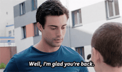 A Man Says Well I 'M Glad You 'Re Back While Talking To Another Man GIF