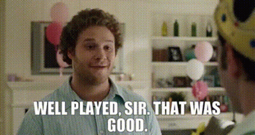 A Man Says Well Played Sir That Was Good In Front Of Balloons . GIF