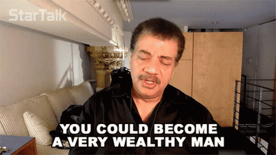 A Man Says You Could Become A Very Wealthy Man In Front Of A Couch GIF