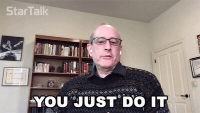 A Man Says You Just Do It In Front Of A Bookcase GIF
