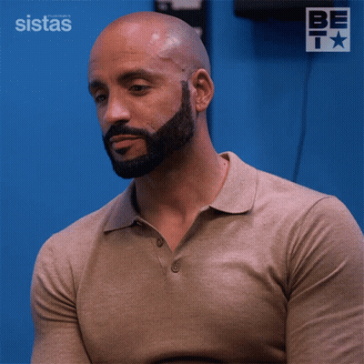 A Man Says You 'Ll Be Alright In Front Of A Blue Background GIF