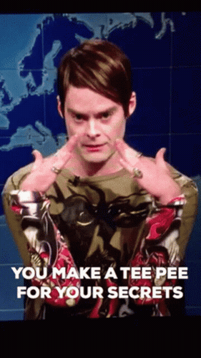 A Man Says You Make A Tee Pee For Your Secrets In Front Of A Map Of The World GIF
