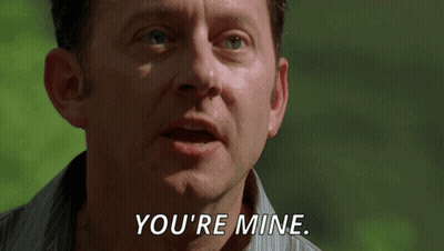 A Man Says " You 'Re Mine " In A Close Up Of His Face GIF