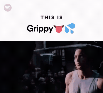 A Man Singing In Front Of A Crowd With The Words This Is Grippy Below Him GIF