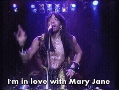A Man Singing Into A Microphone With The Caption I 'M In Love With Mary Jane GIF