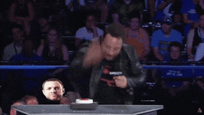 A Man Singing Into A Microphone With The Word Yee On The Bottom Right GIF