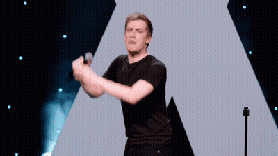 A Man Singing Into A Microphone With The Words Burn It Written Below Him GIF
