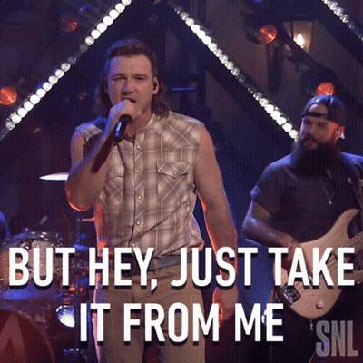 A Man Singing Into A Microphone With The Words But Hey Just Take It From Me GIF