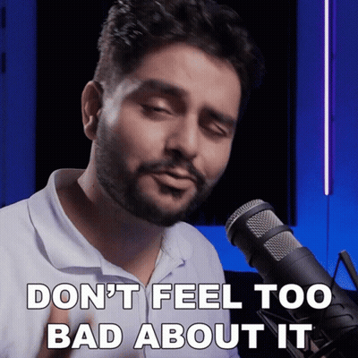 A Man Singing Into A Microphone With The Words Do N't Feel Too Bad About It GIF