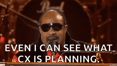 A Man Singing Into A Microphone With The Words Even I Can See What Cx Is Planning Behind Him GIF