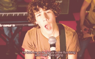 A Man Singing Into A Microphone With The Words He Took Me To The Future In The Flux Thing And I Saw Everything GIF