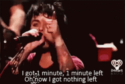 A Man Singing Into A Microphone With The Words I Got 1 Minute , 1 Minute Left Oh Now I Got Nothing Left GIF