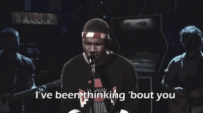 A Man Singing Into A Microphone With The Words I 'Ve Been Thinking Bout You Above Him GIF