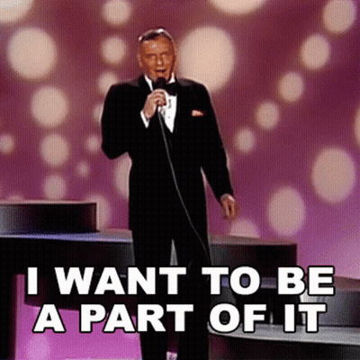 A Man Singing Into A Microphone With The Words " I Want To Be A Part Of It " Above Him GIF