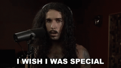 A Man Singing Into A Microphone With The Words I Wish I Was Special GIF