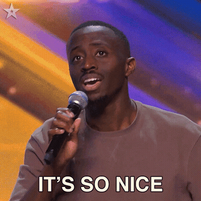 A Man Singing Into A Microphone With The Words It 'S So Nice Written Below Him GIF
