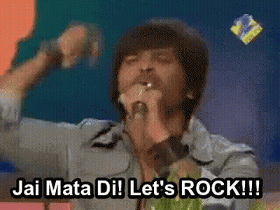 A Man Singing Into A Microphone With The Words " Jai Mata Dil Let 'S Rock !!! " Below Him GIF