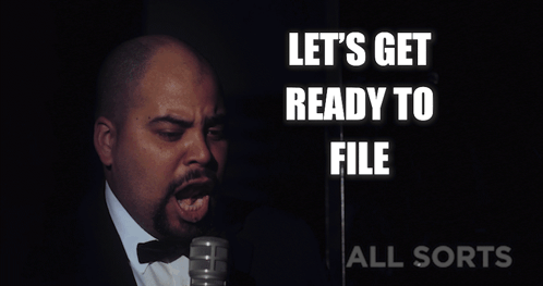 A Man Singing Into A Microphone With The Words Let 'S Get Ready To File All Sorts Behind Him GIF