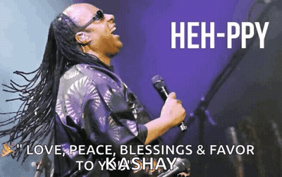 A Man Singing Into A Microphone With The Words " Love Peace Blessings & Favor To Yka Shay " GIF