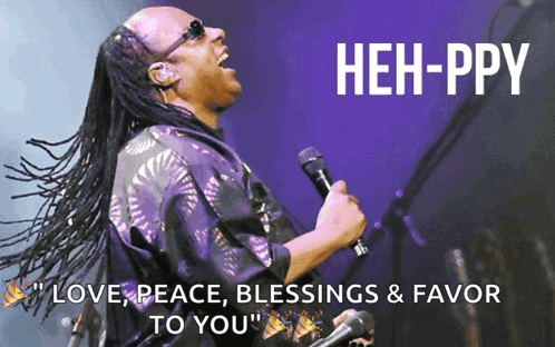 A Man Singing Into A Microphone With The Words " Love Peace Blessings & Favor To You " On The Bottom GIF