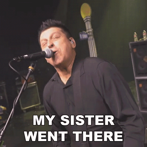 A Man Singing Into A Microphone With The Words " My Sister Went There " Next To Him GIF