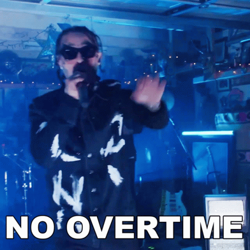 A Man Singing Into A Microphone With The Words " No Overtime " Above Him GIF