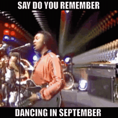 A Man Singing Into A Microphone With The Words Say Do You Remember Dancing In September On The Bottom GIF