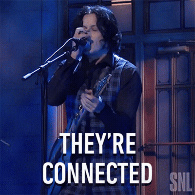 A Man Singing Into A Microphone With The Words They 'Re Connected GIF