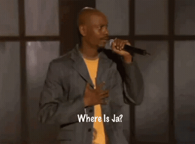 A Man Singing Into A Microphone With The Words Where Is Ja Written On The Bottom GIF