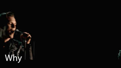 A Man Singing Into A Microphone With The Words Why You Wanna Fight It On The Bottom GIF