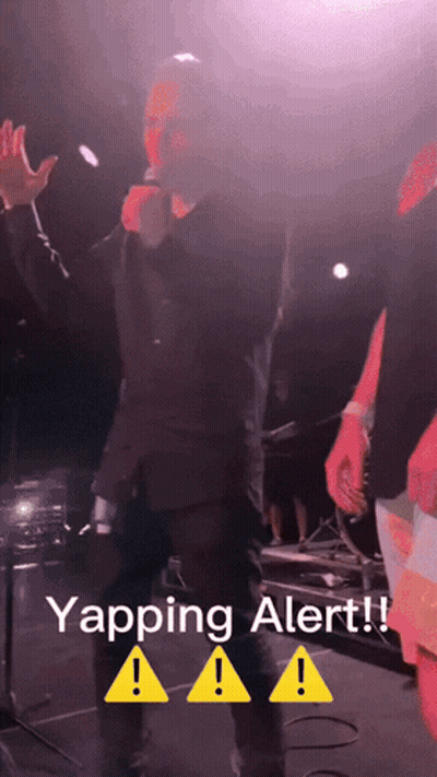 A Man Singing Into A Microphone With The Words Yapping Alert GIF