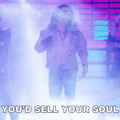 A Man Singing Into A Microphone With The Words " You 'D Sell Your Soul " Behind Him GIF