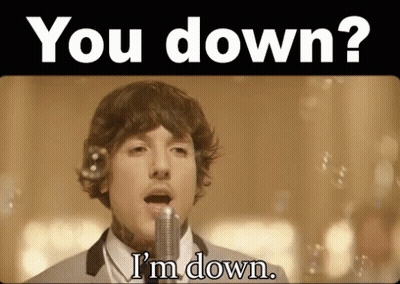 A Man Singing Into A Microphone With The Words You Down I 'M Down GIF