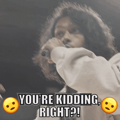A Man Singing Into A Microphone With The Words You 'Re Kidding Right GIF