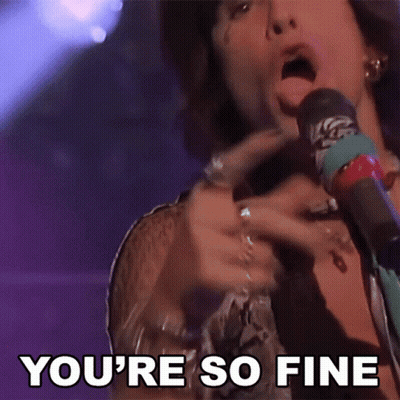 A Man Singing Into A Microphone With The Words " You 'Re So Fine " Behind Him GIF
