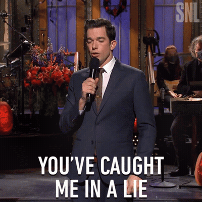 A Man Singing Into A Microphone With The Words You 'Ve Caught Me In A Lie GIF