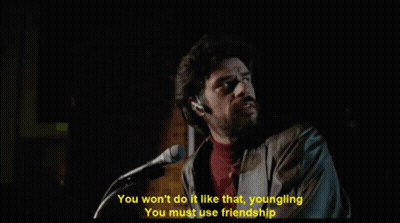 A Man Singing Into A Microphone With The Words You Won 'T Do It Like That Youngling You Must Use Friendship GIF