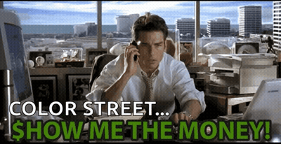 A Man Sits At A Desk Talking On A Cell Phone With The Words Color Street Show Me The Money Below Him GIF