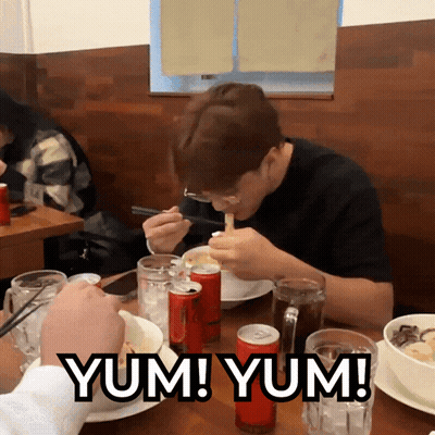 A Man Sits At A Table With A Can Of Coca Cola In Front Of Him GIF