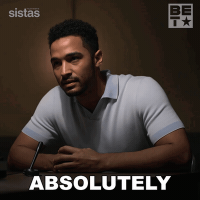 A Man Sits At A Table With The Word Absolutely Written On The Bottom GIF