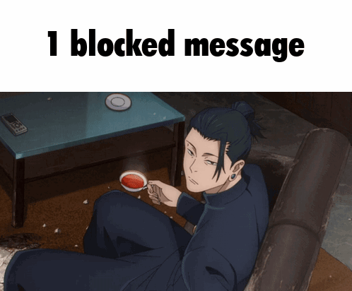 A Man Sits In A Chair Holding A Cup Of Coffee With The Words 1 Blocked Message Above Him GIF