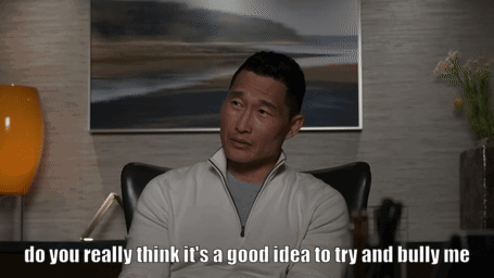 A Man Sits In A Chair With The Words Do You Really Think It 'S A Good Idea To Try And Bully Me GIF