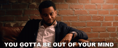 A Man Sits In A Chair With The Words You Gotta Be Out Of Your Mind Written Below Him GIF